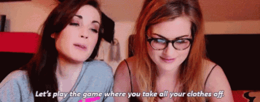two women playing a game where you take all your clothes off