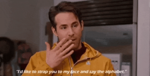 a man in a yellow jacket is saying i 'd like to strap you to my face