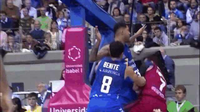 a man in a blue jersey with the number 8 on it