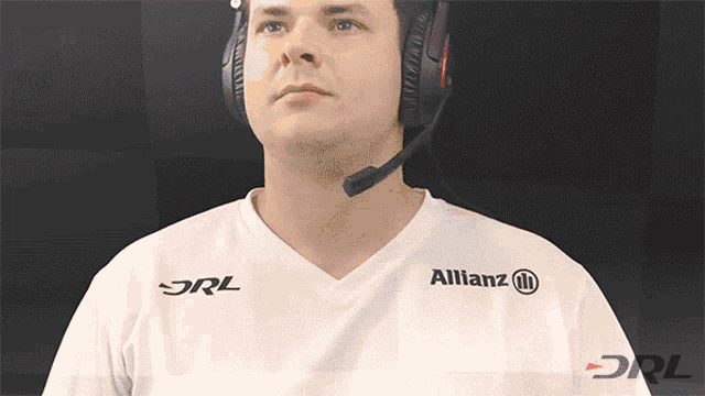 a man wearing headphones and a allianz shirt