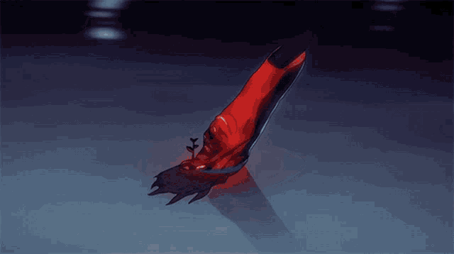a red object is floating in a circle of water with a plant growing out of it