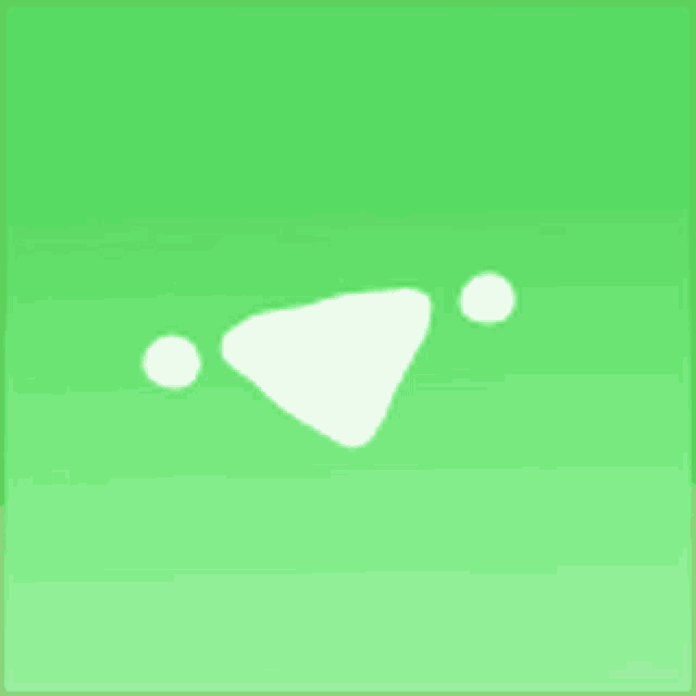 a green square with a white triangle and two dots on it
