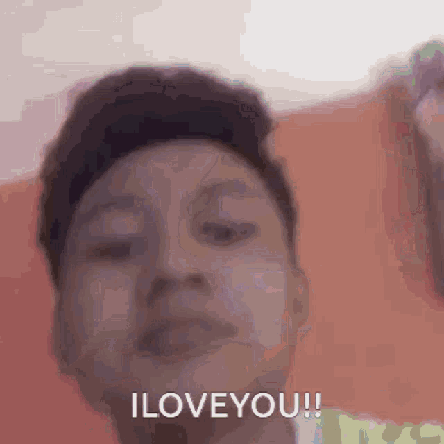 a close up of a person 's face with the words i love you written on it