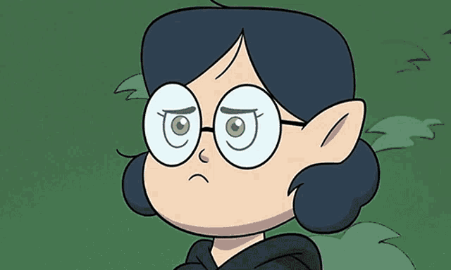 a cartoon girl wearing glasses and a black hoodie has a sad look on her face .