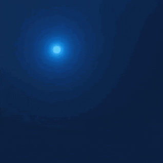 a blue glowing ball with a white center is moving in the dark .
