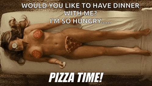a naked woman laying on a bed with a slice of pizza on her breast
