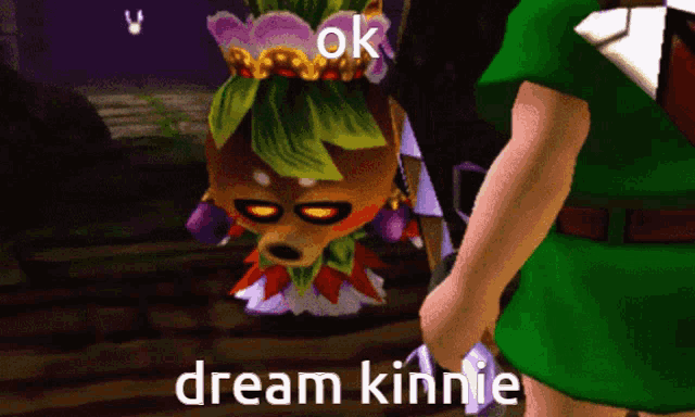 a video game character is standing next to a cartoon character that says dream kinnie