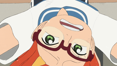 a cartoon character with red hair and green eyes is laying upside down
