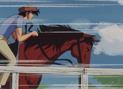 a man is riding a horse behind a fence
