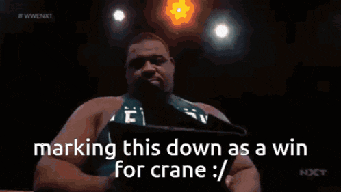 a person is holding a piece of paper that says ' marking this down as a win for crane '