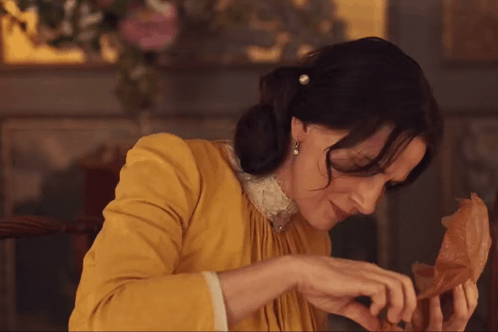 Eugénie Looking At Her Plate And Looking Up To Laugh The Taste Of Things GIF - Eugénie Looking At Her Plate And Looking Up To Laugh The Taste Of Things The Taste Of Things Film GIFs