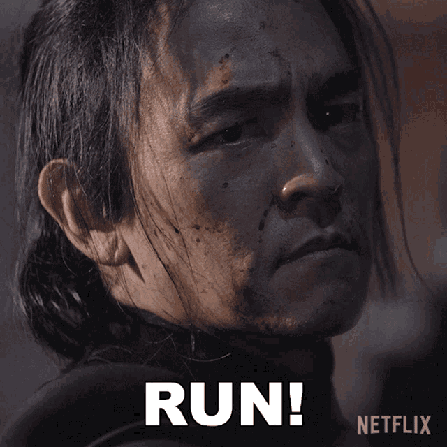 a netflix ad shows a man with blood on his face and the words run on the bottom
