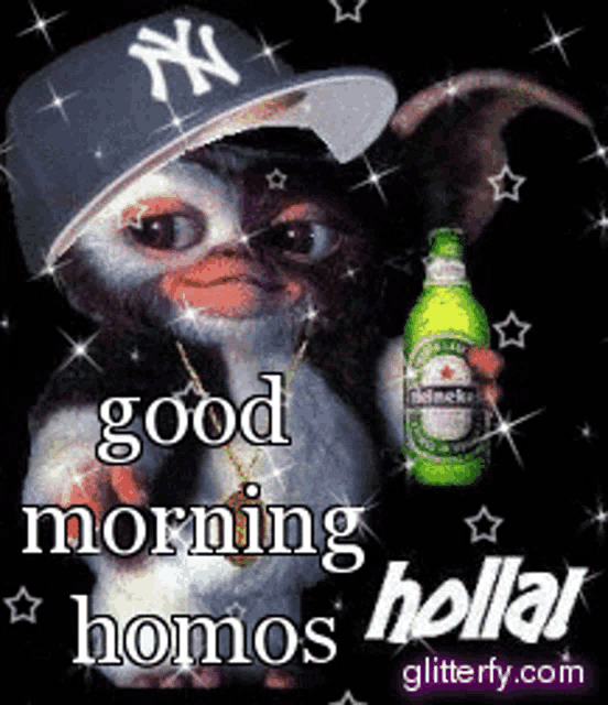 a gizmo wearing a ny yankees hat is holding a bottle of heineken beer