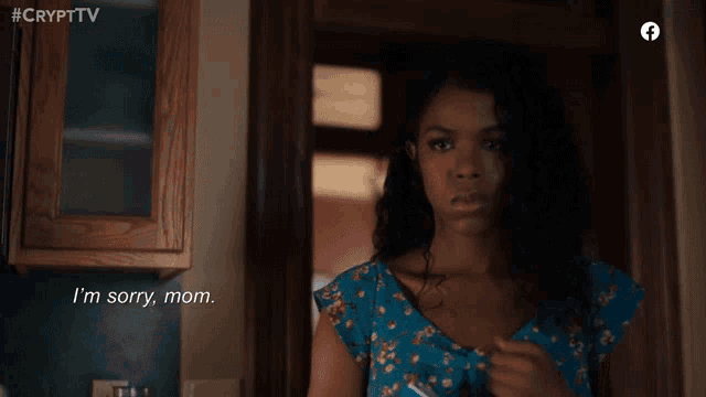 a woman says i 'm sorry mom in front of a door