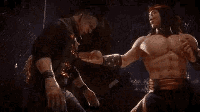a person is holding another person 's hand with a fireball coming out of it .