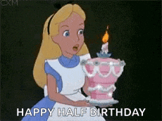 alice from alice in wonderland is holding a birthday cake with a candle on it .