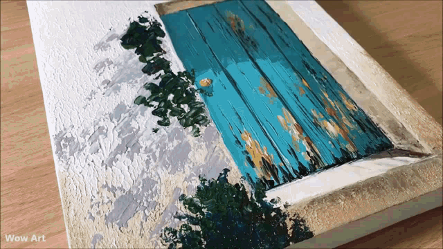a painting of a blue door has wow art written on the bottom