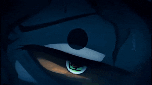 a close up of a person 's eye with a red circle in the middle