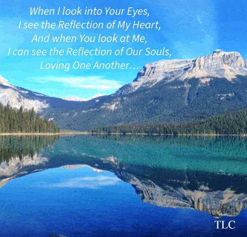 a picture of a lake with mountains in the background and a poem about loving one another