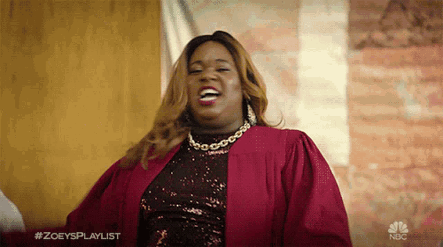 a woman in a graduation cap and gown is laughing with the hashtag #zoeysplaylist on the bottom