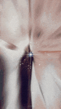 a blurred image of a star with a purple center
