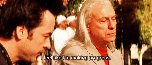 a man says i feel like i 'm making progress while standing next to another man