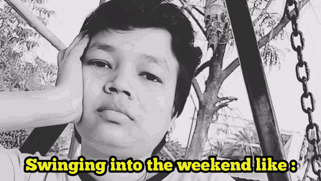 a man sitting on a swing with the words swinging into the weekend like below him