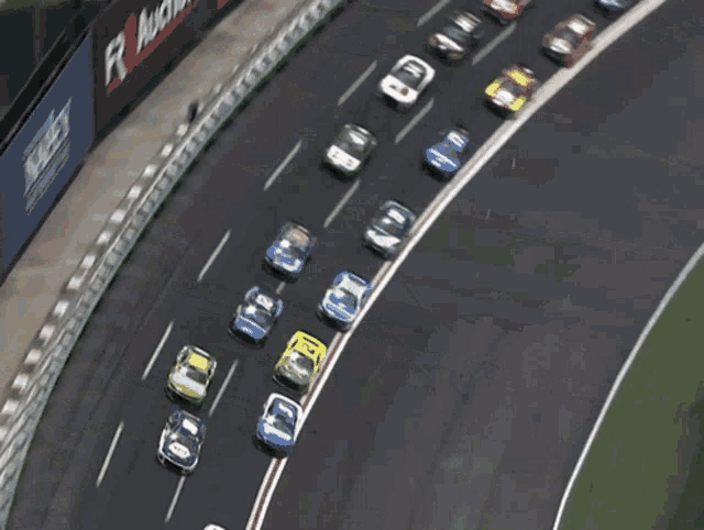 a bunch of toy cars are driving down a road and one of them has the number 88 on it