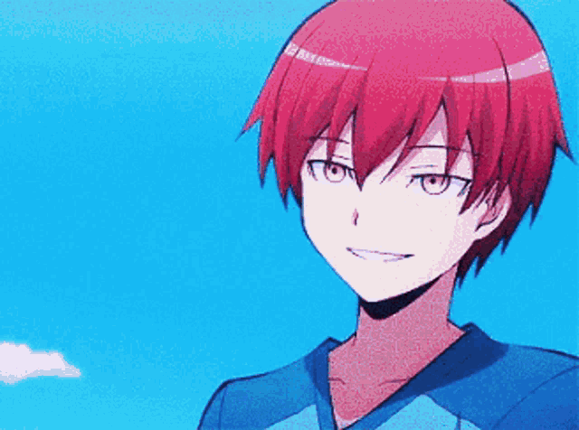 a boy with red hair is wearing a blue shirt and smiling in front of a blue sky .