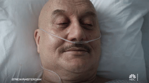Waking Up Dr Vijay Kapoor GIF - Waking Up Dr Vijay Kapoor New Amsterdam GIFs