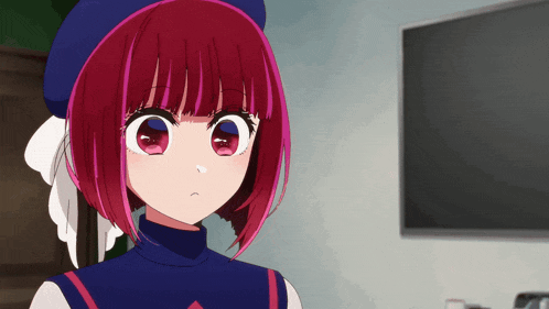 a girl with red hair and a blue hat