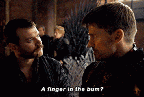 two men are looking at each other and one of them is asking the other if he has a finger in the bum