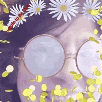 a woman wearing round glasses with flowers in the background and the words " apple to be here " on the bottom