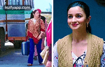 a woman is walking down the street next to a bus and a woman is smiling .