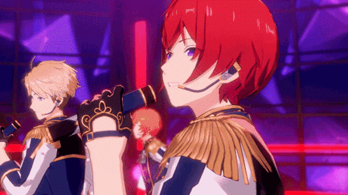 a man with red hair is holding a microphone