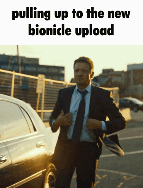 a man in a suit and tie is pulling up to a new bionicle upload