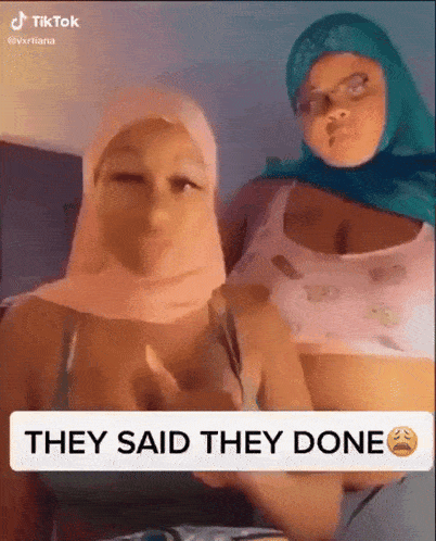 two women wearing hijabs and bras are standing next to each other and they said they done .