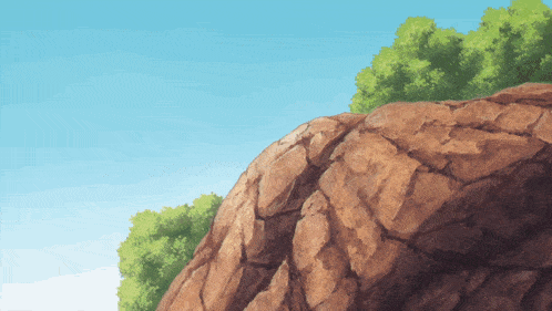 a rocky hillside with trees on it and a blue sky in the background