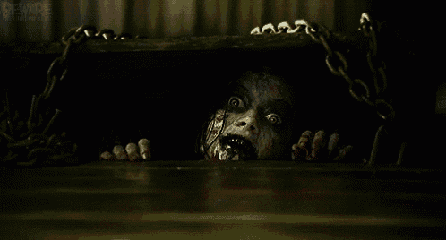a scary face is coming out of a box with beware written on the bottom right