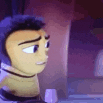 a close up of a bee from the bee movie looking at a computer screen .