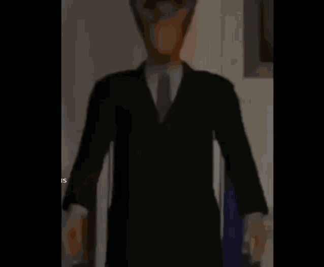 a cartoon man in a suit and tie is standing in a room .