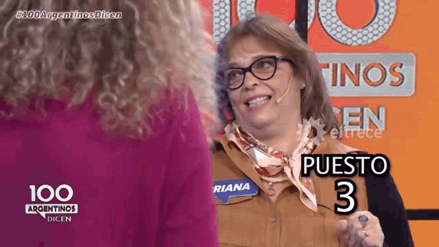 a woman with a name tag that says riana