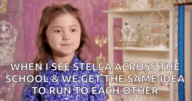 a little girl is smiling and talking about stella across the school and we get the same idea to run to each other .