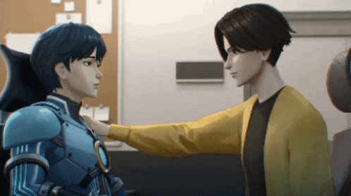 a man in a yellow sweater is touching another man 's arm