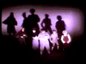 a blurry picture of a group of people standing in a line