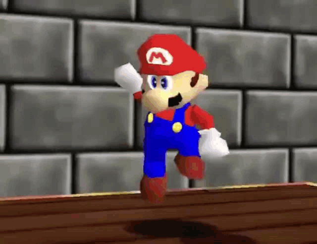 a video game character named mario is standing on a ledge