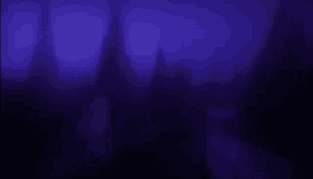 a dark purple background with a blurred image of a castle