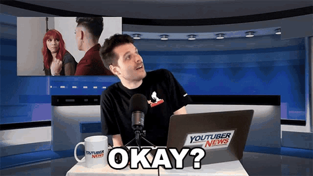 a man sitting in front of a youtuber news laptop