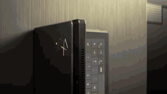 a black laptop with the letter a on the side