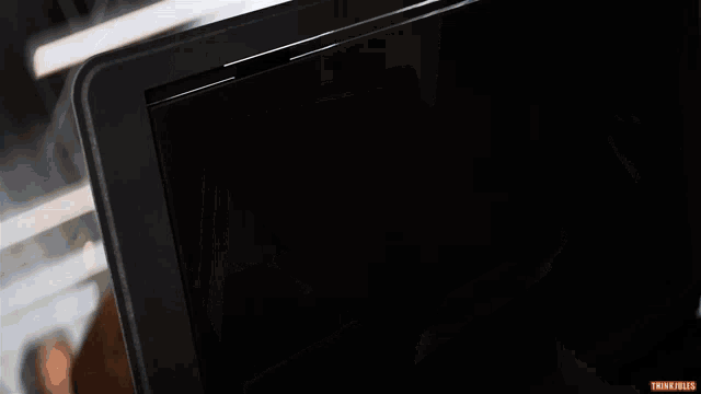 a black laptop with the words thinkjeles on the bottom right